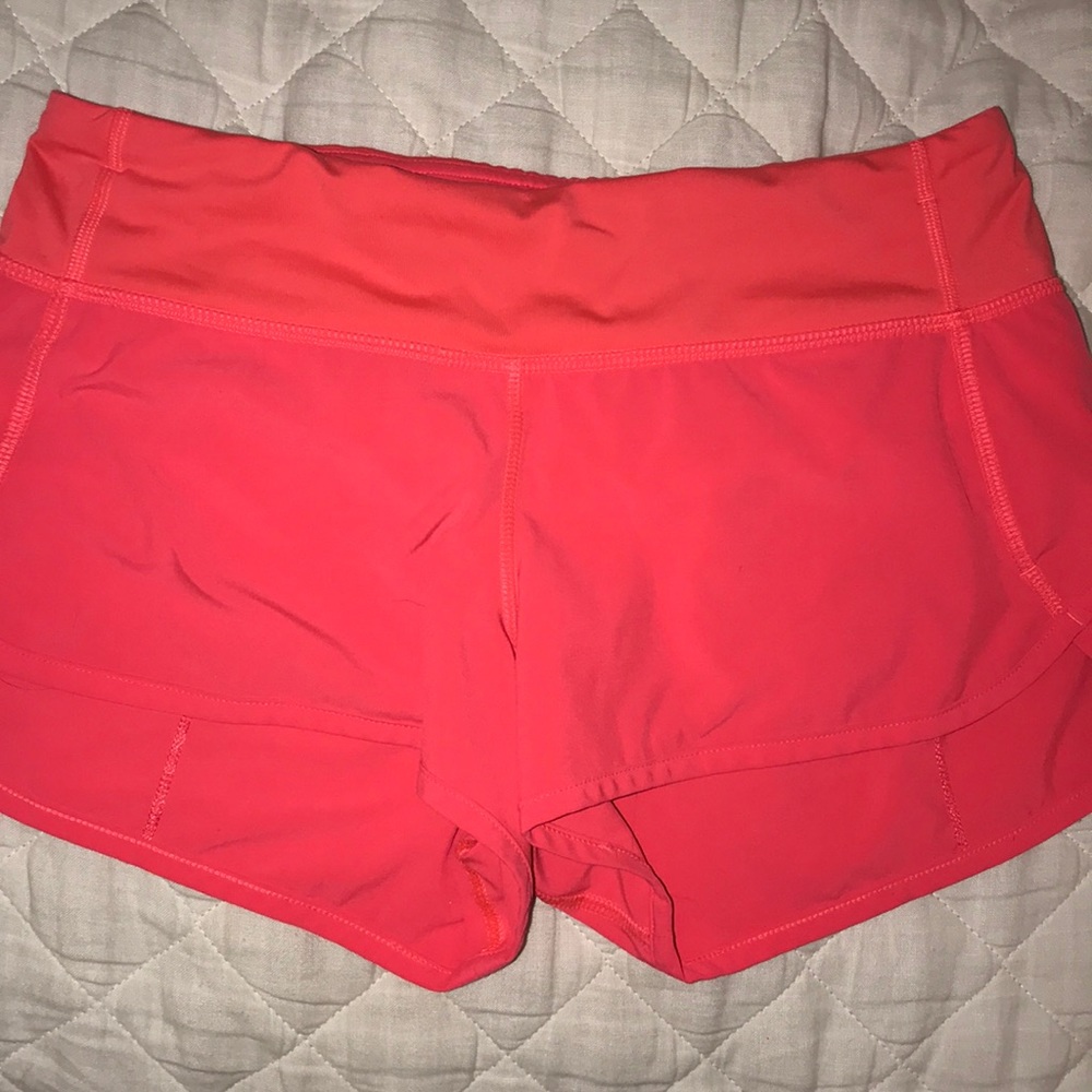 Size 4 neon pink lululemon shorts